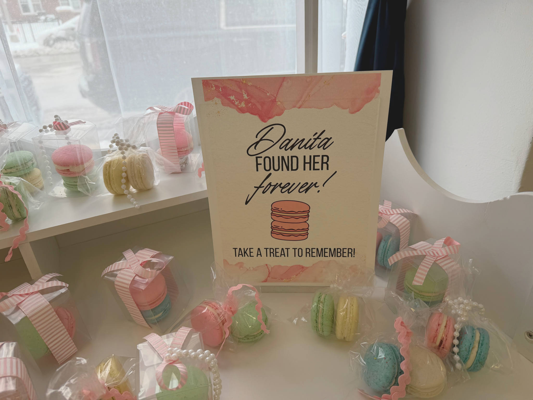 Bridal shower with macaron favors and custom sign
